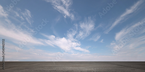Heavenly Blue Sky Background with Beautiful Nice Weather Clouds and Empty Gray Asphalt Floor