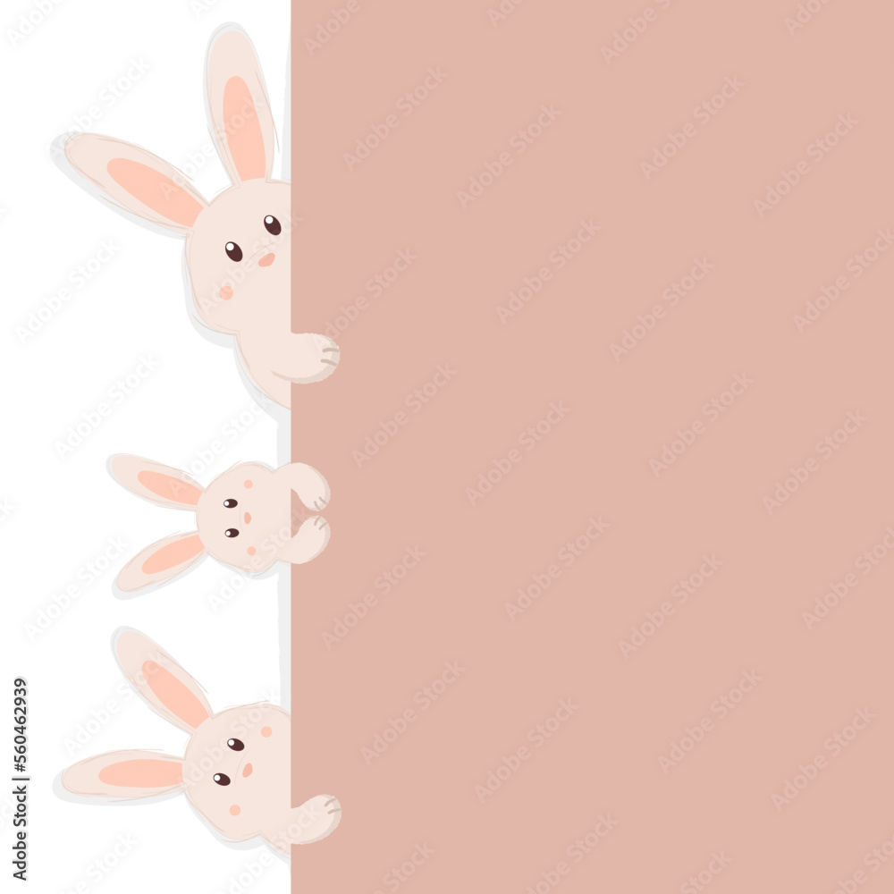 Cute Easter bunnies peeking out from behind the beige wall