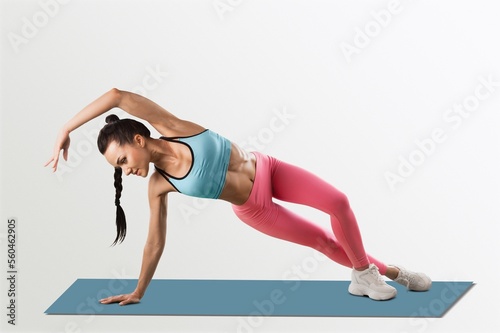 Fitness sporty young woman doing exercises