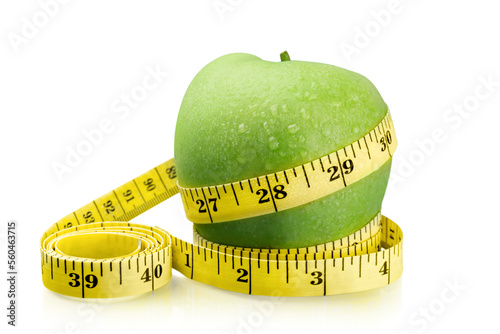 Raw fresh apple with measuring tape