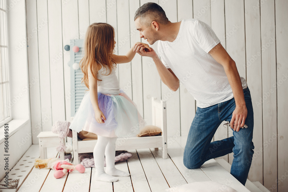 Fototapeta premium Father playing with a little daughter