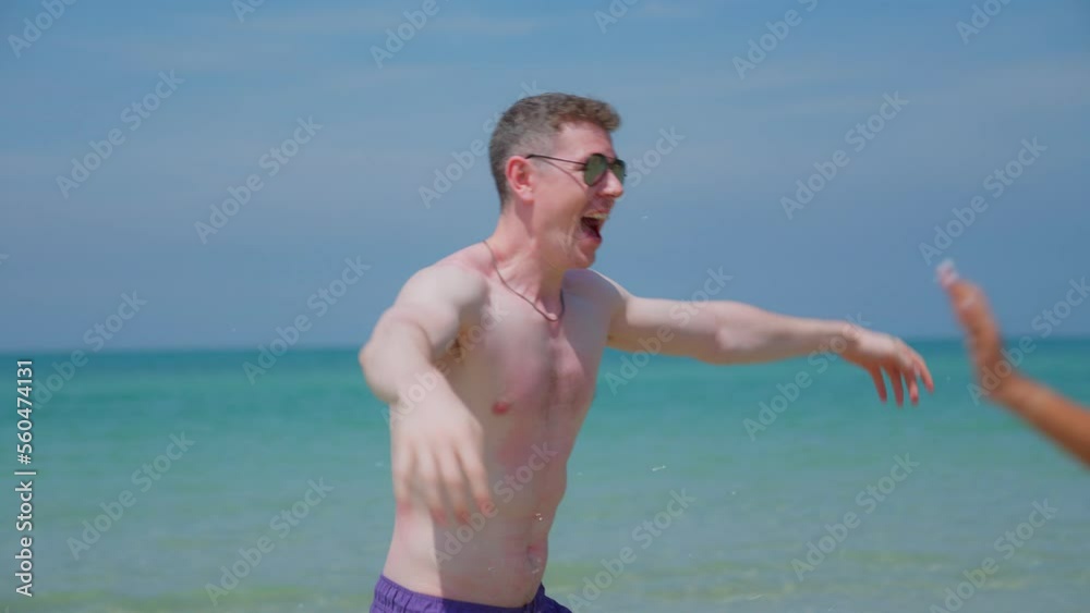 Man and woman run to meet each other in embrace at the beach. Lover enjoy sweet at the sea. Couple travel during Valentine's Day. honeymoon romantic kiss date concept. Slow motion 4K. Man and woman run to meet each other in embrace at the beach. Lover enjoy sweet at the sea. Couple travel during Valentine's Day. honeymoon romantic kiss date concept. Slow motion 4K.