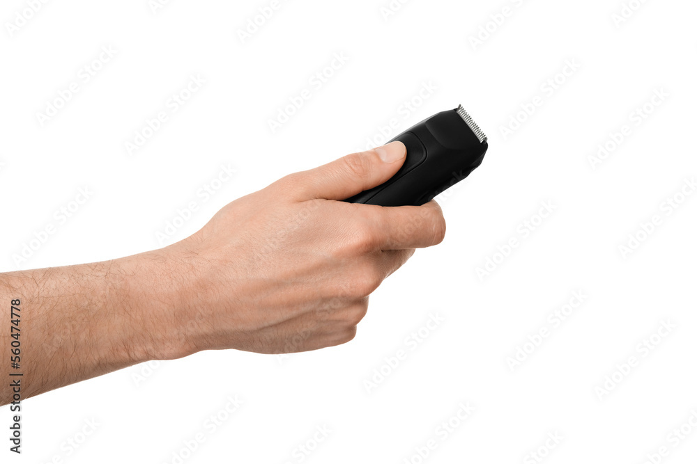 Φωτογραφία Dark trimmer for cutting hair and beard in a male hand, isolate on a white background