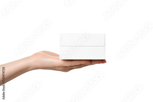 White box on a female palm, without inscriptions, isolate on a white background.