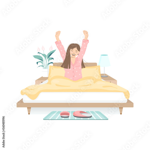 Girl stretching on the bed in the morning after a good night's sleep