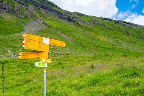 Trail sign in the Swiss Alps photo