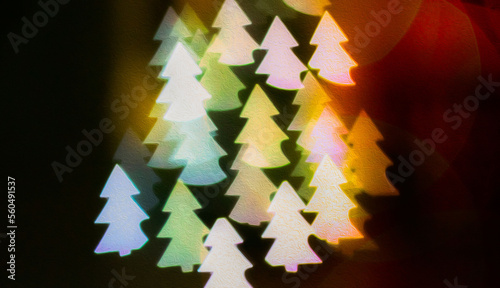 Glowing Christmas tree bokeh effect on a dark night