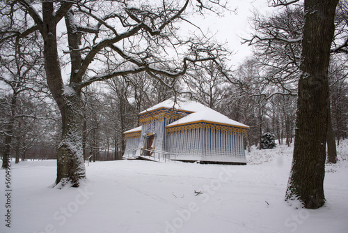 View of The Guards Tent  Vakttaltet  in the Drottningholm Palace park located in Stockholm  Sweden. The garden is covered in snow.