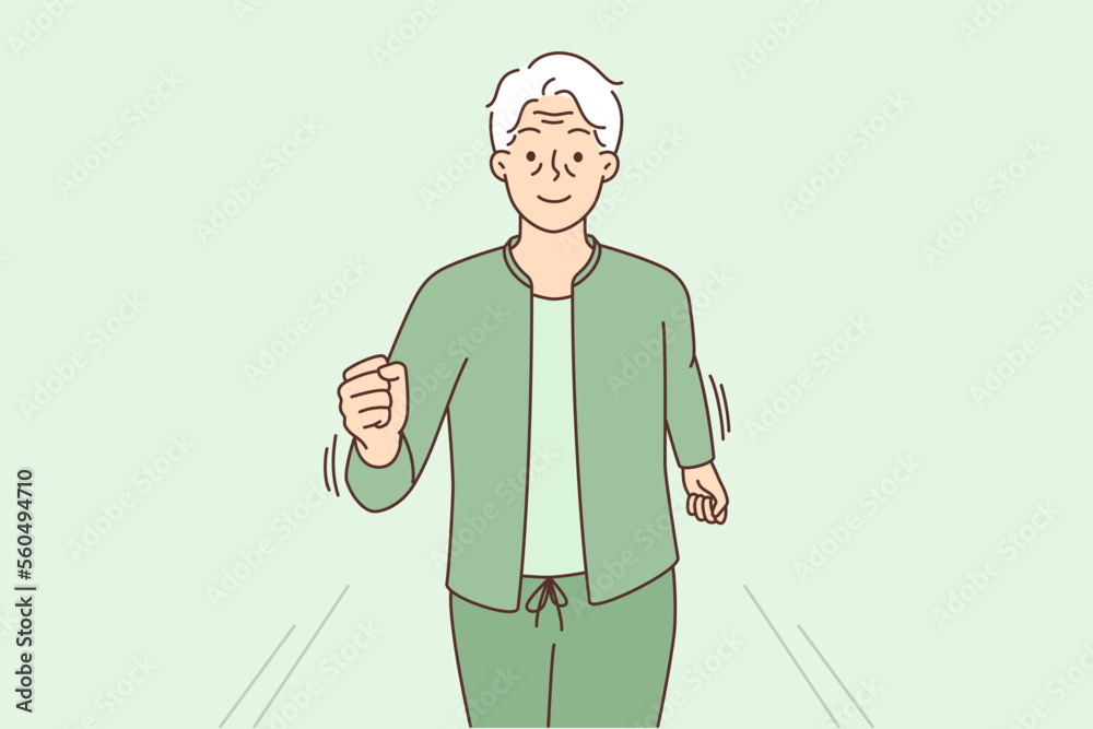 Happy energetic grandfather running outdoors 