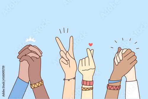 Multiethnic people holding hands 