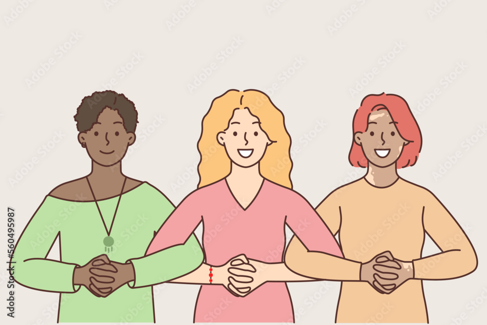 Smiling multiracial women show unity Smiling multiracial women show unity