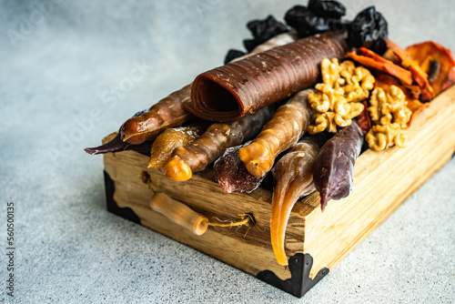 Traditional Georgian churchkhela, tklapi and gozinaki with assorted dried fruits and nuts photo