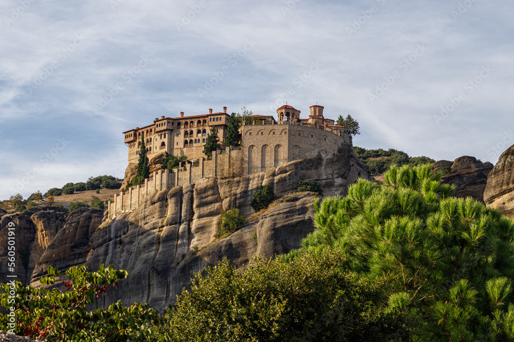 Mountain view with Varlaam monastery. Meteora Kalambaka Greece. Travel, hiking, vacation. Famous Greek orthodox christian shrine, unique rock formation, Unesco world heritage site.