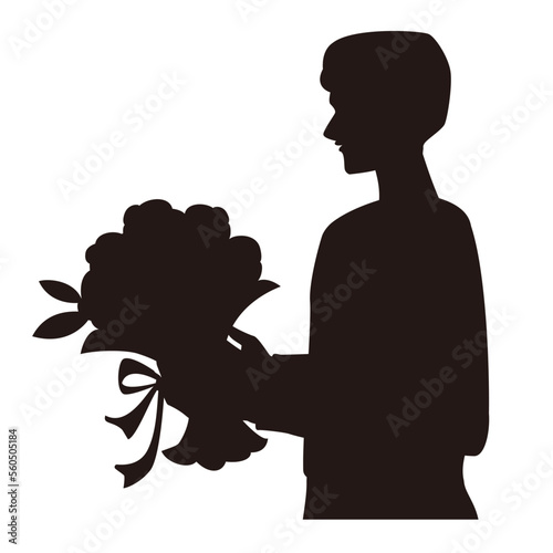 花束を渡そうとしている横顔の男性の白黒のシルエット。