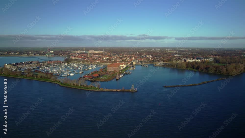 Orbit shot historical harbor city in Hoorn Noord-Holland the Netherlands. Cityscape Aerial view Morning in Winter.