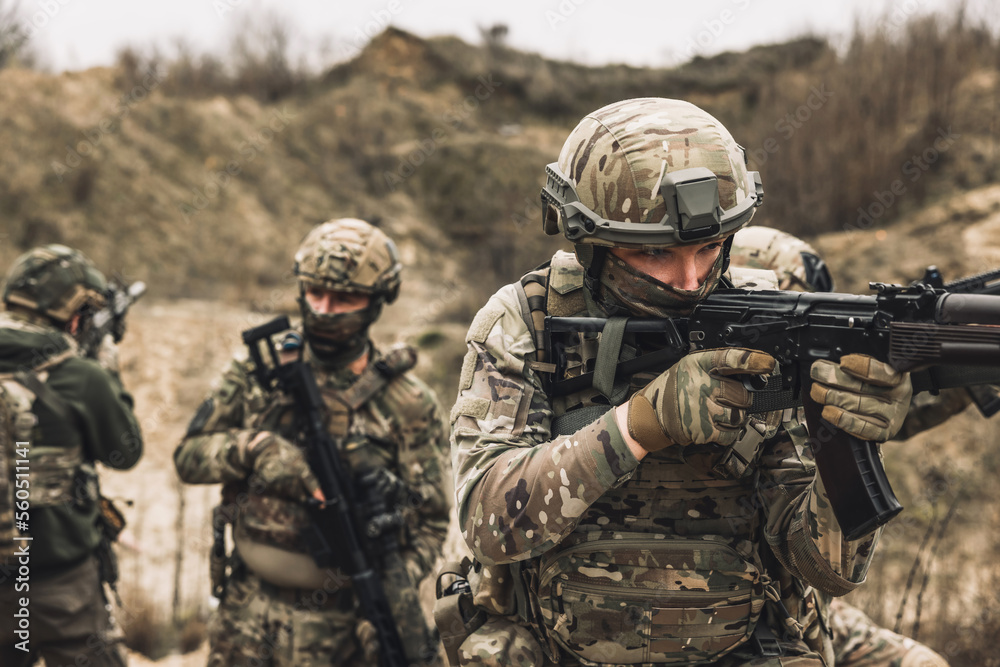 Fototapeta premium Group of soldiers on a shooting range