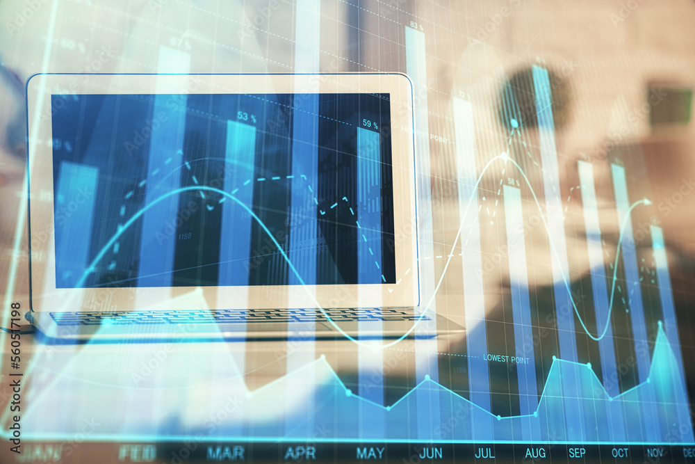 Financial chart drawing and table with computer on background. Multi exposure. Concept of international markets. Financial chart drawing and table with computer on background. Multi exposure. Concept of international markets.