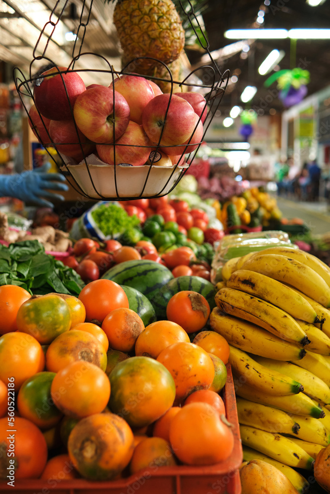 fruit and vegetable market stand with tropical colombian fruits