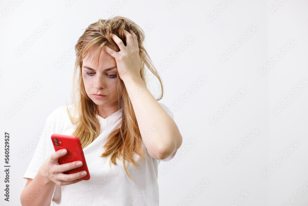 woman crying with smartphone on white background woman crying with smartphone on white background