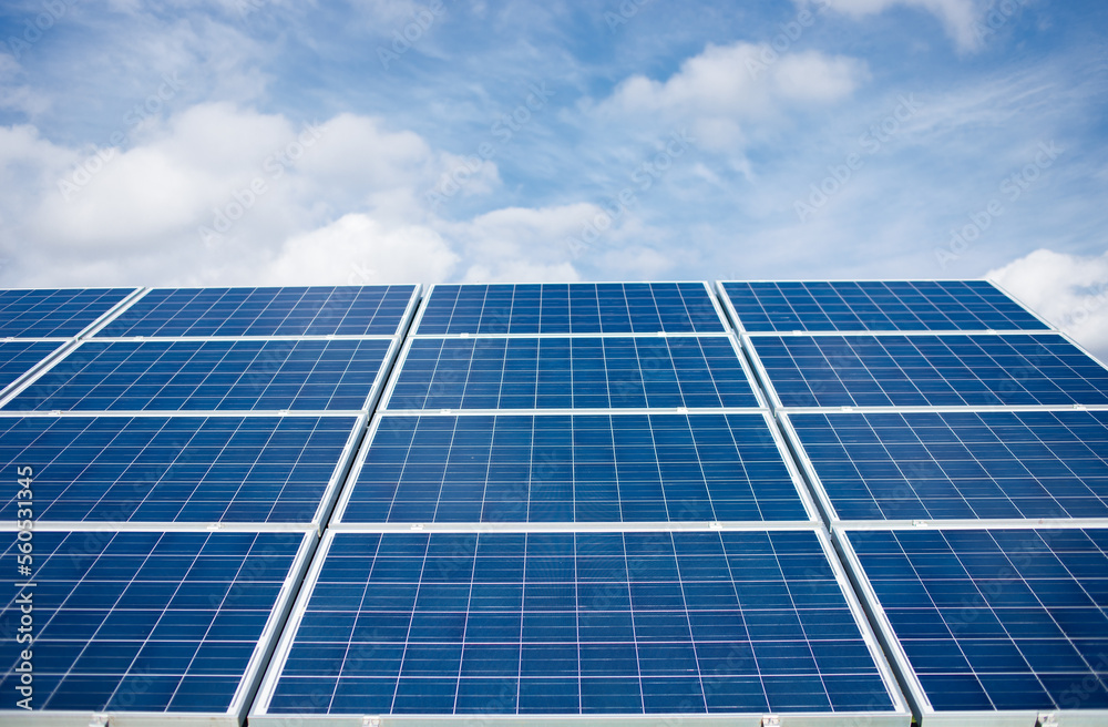 Solar power panel on blue sky background, alternative clean green energy concepts. Solar power panel on blue sky background, alternative clean green energy concepts.