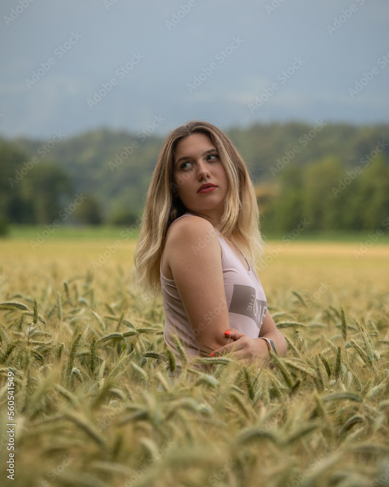 portrait of a woman in a field of wheat portrait of a woman in a field of wheat