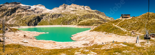 High resolution stitched panorama with reflections in a lake at the famous Weisssee Gletscherwelt, Uttendorf, Salzburg, Austria photo