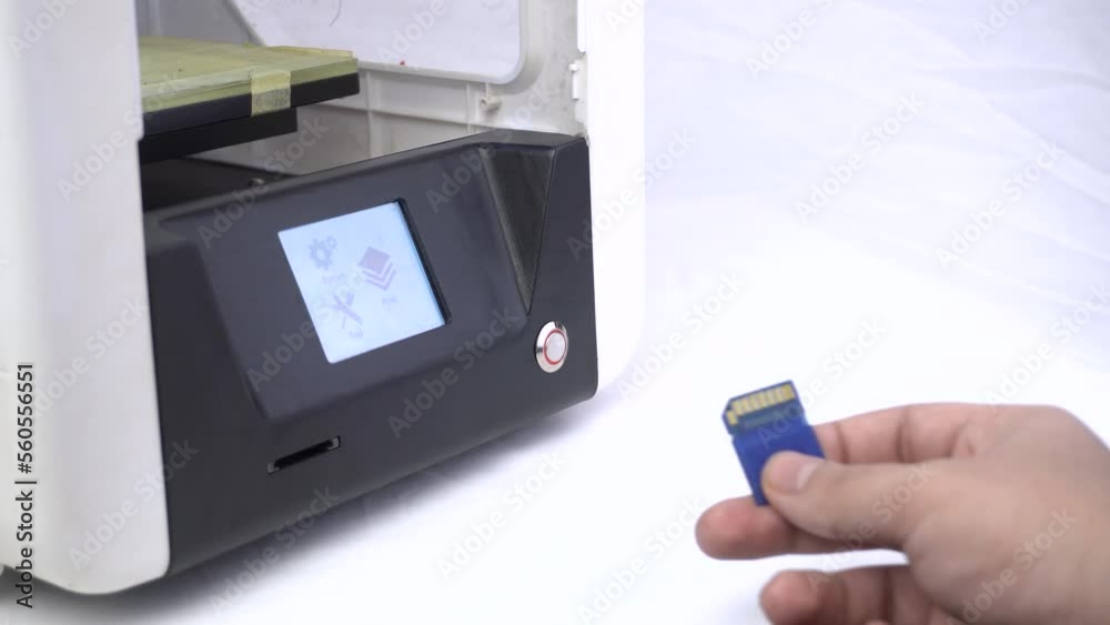 Inserting and Removing SD Card from 3D Printer Stock Video Adobe Stock