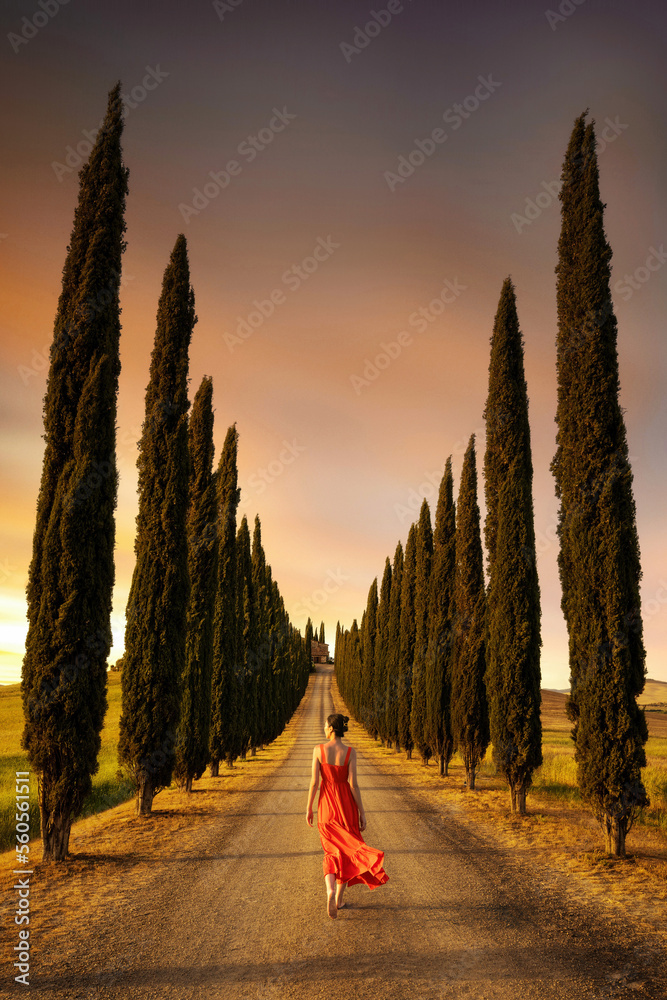 Woman in red dress in Tuscany taken in May 2022