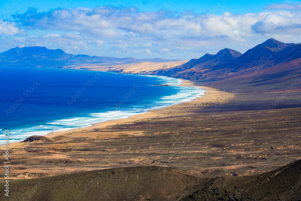 Cofete beach in the south of Fuerteventura in the Canary Islands, Spain - Long sandy beach in a desert wild area protected by mountains overlooking the Atlantic Ocean