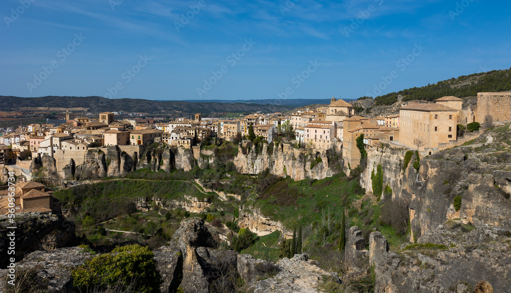 Scenic view of ancient Spanish city of Cuenca, located in mountains on rocky ledge on spring day..