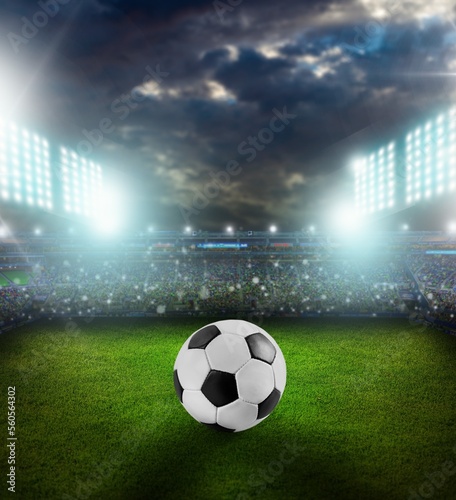 Classic soccer ball in big field stadium. © BillionPhotos.com