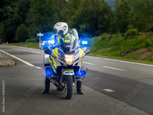 Police motorcycle rider on the road