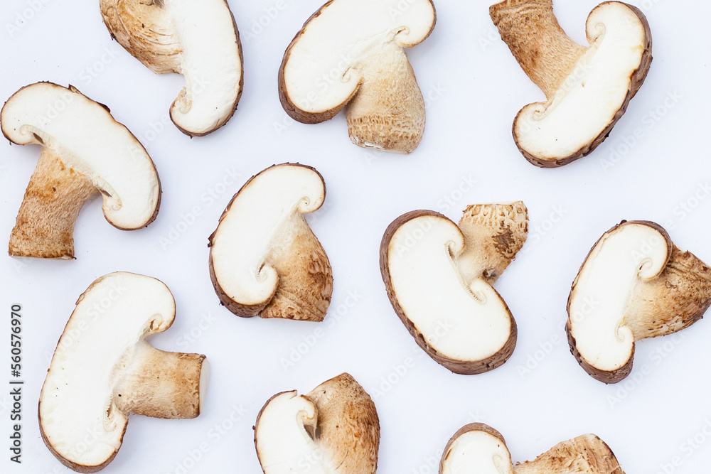 Fresh shiitake mushrooms on white Fresh shiitake mushrooms on white