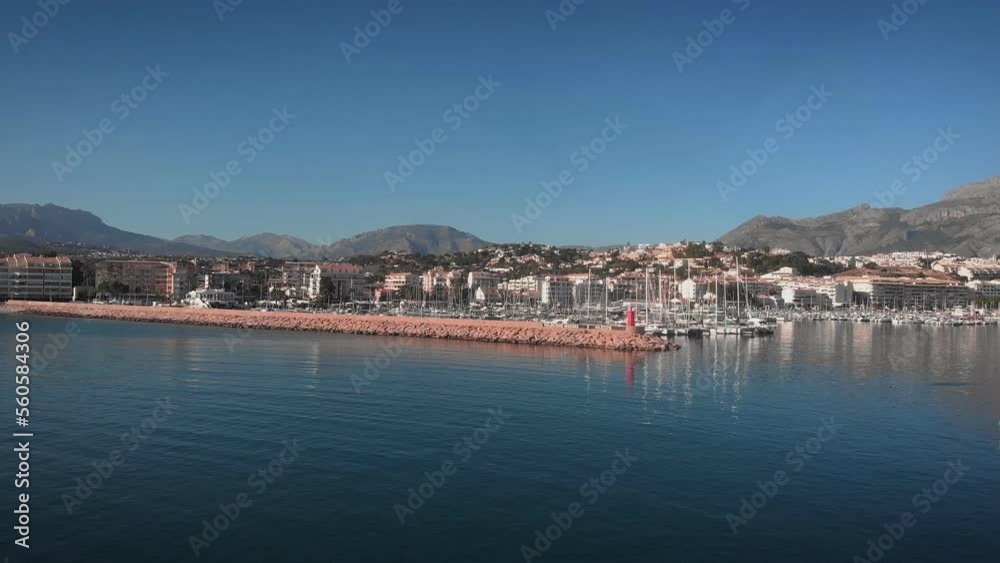 Harbour with moored white yachts in Javea, Spain. Sea port with luxury boats Harbour with moored white yachts in Javea, Spain. Sea port with luxury boats