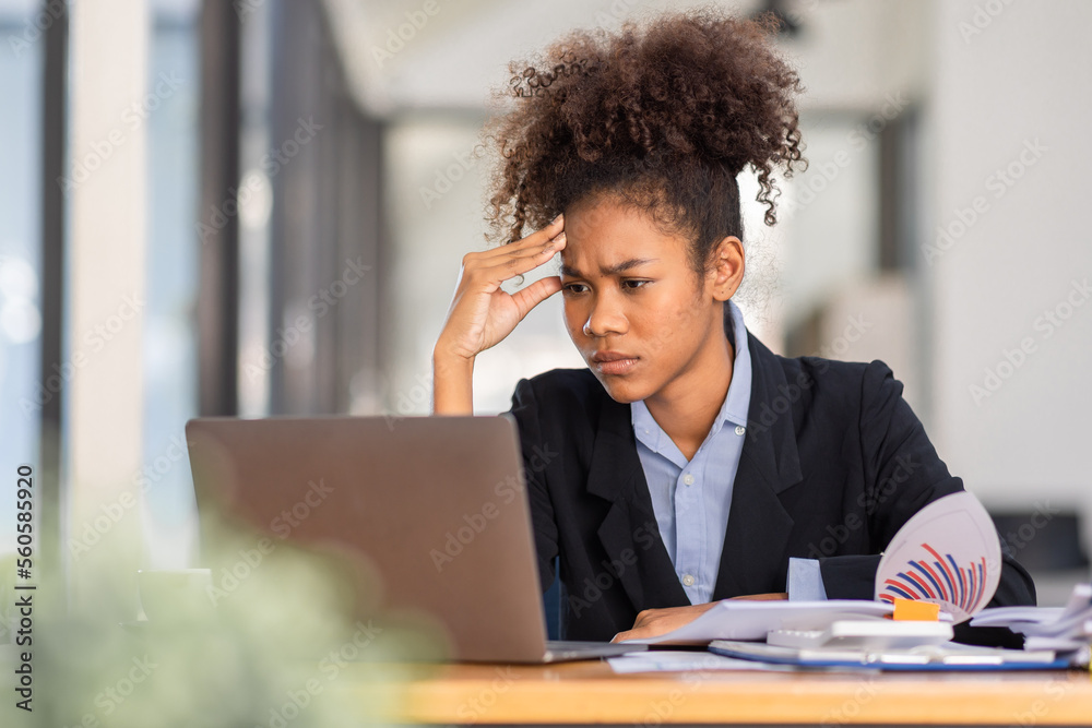 Feeling sick and tired problems after long time working on laptop computer working place in office. Frustrated young african american woman work document exchange finance accounting concept Feeling sick and tired problems after long time working on laptop computer working place in office. Frustrated young african american woman work document exchange finance accounting concept
