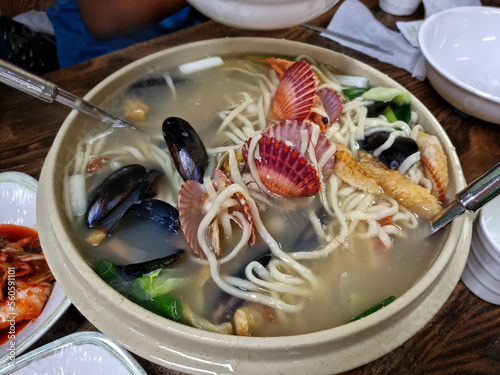 
It is seafood kalguksu with clams. photo