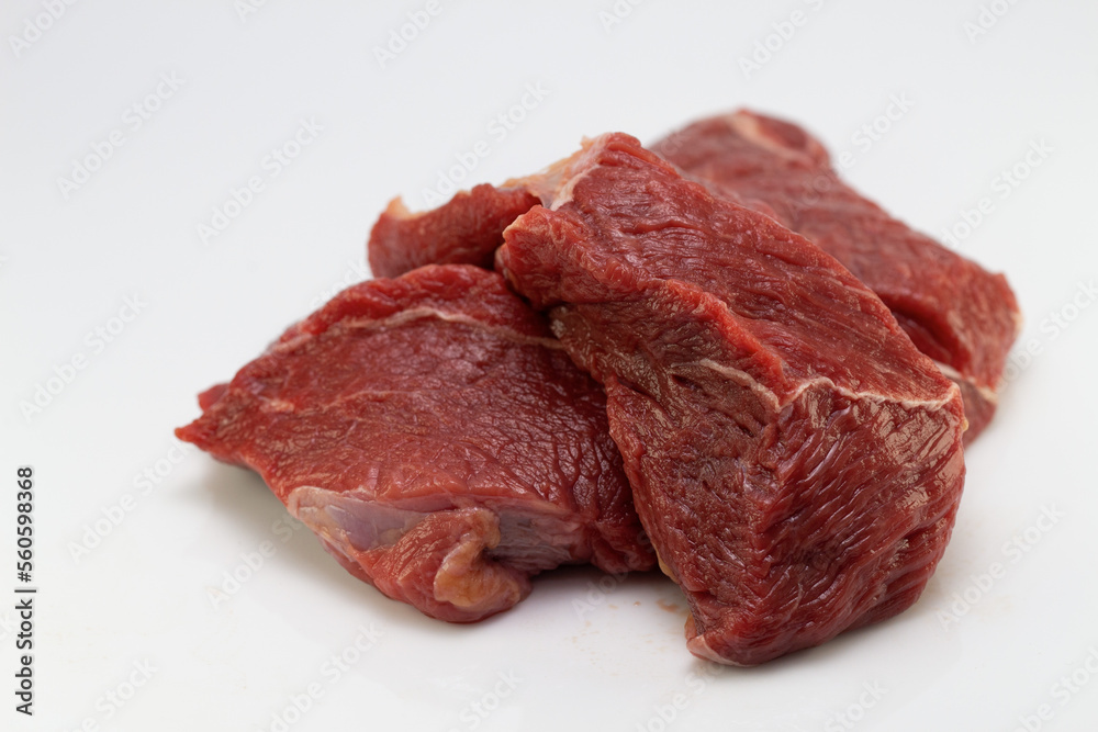 Fototapeta premium raw beef isolated on white background