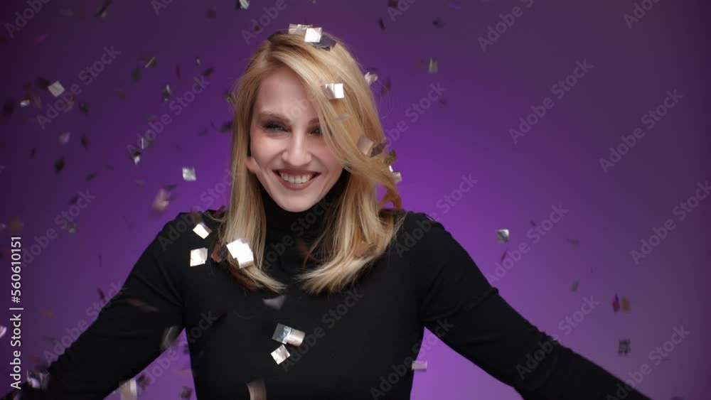 Close-up shot of attractive, blonde-haired woman looking at camera. Portrait of young, caucasian lady enjoying holiday decorations. High quality 4k footage Close-up shot of attractive, blonde-haired woman looking at camera. Portrait of young, caucasian lady enjoying holiday decorations. High quality 4k footage