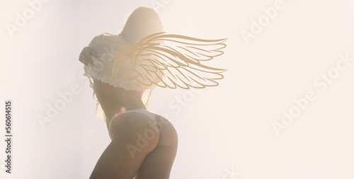 Фотография Valentines day photo banner of sexy woman with wings, slim body booty buttocks