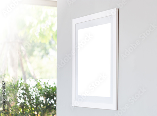 Mockup image of Blank photo frame white screen posters and on wall in coffee shop  Wooden frame for advertising
