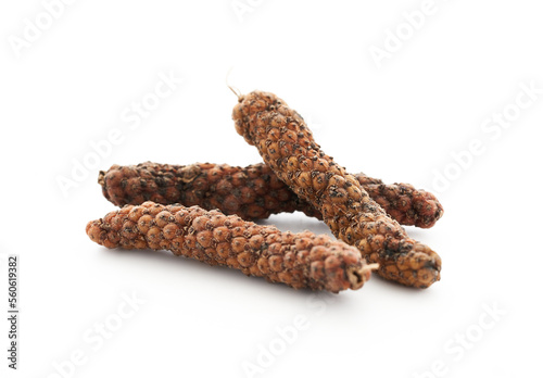 long pepper or piper longum isolated on white background. heap of long pepper or piper longum isolated. long pepper, piper longum 