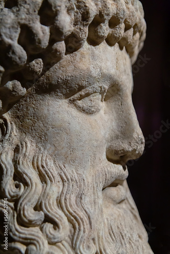Head of Hermes. Roman statue from Tenedos (Canakkale), I century CE. Istanbul, Turkey (Turkiye). Close up, selected focus. History, religion and art concept photo