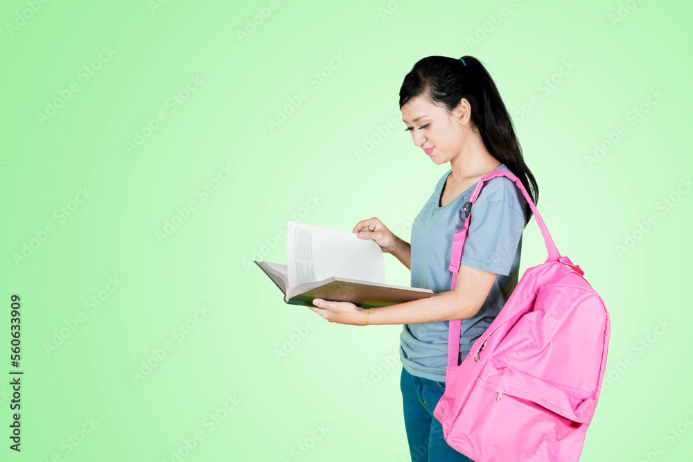 Asian young woman college university school student reading book Asian young woman college university school student reading book