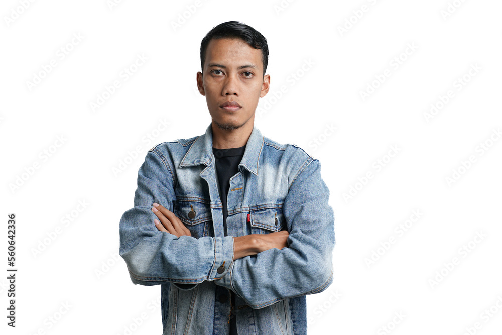 Asian man wearing a blue jean jacket poses cool, quirky like a model. Isolated by white background Asian man wearing a blue jean jacket poses cool, quirky like a model. Isolated by white background