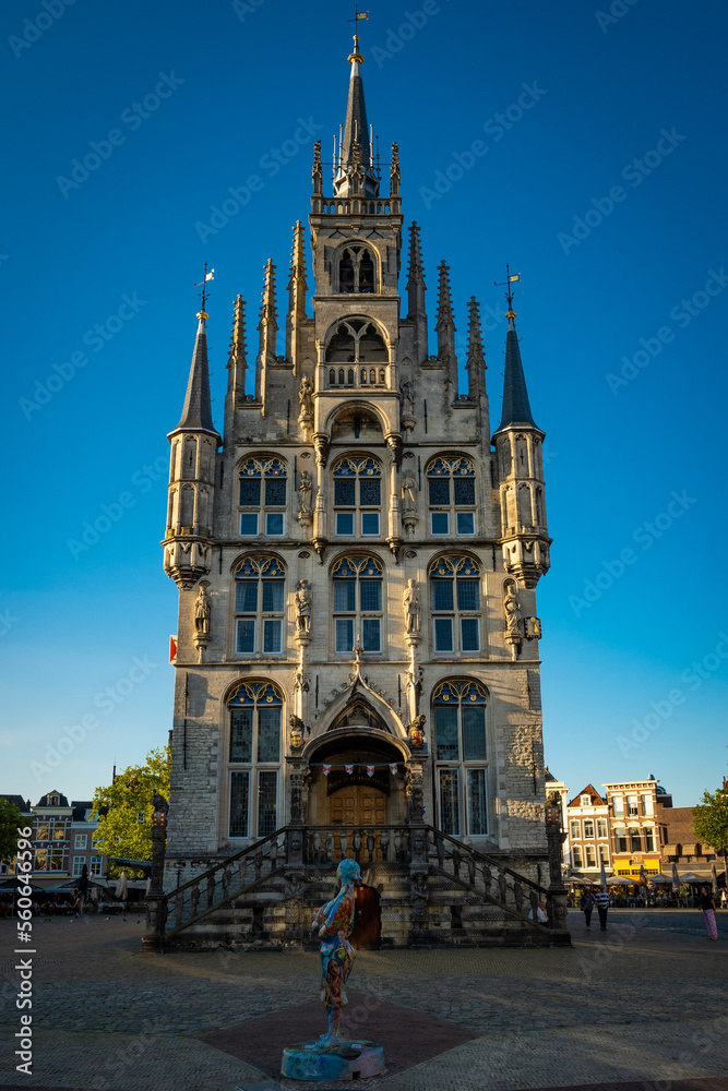 Town or city hall in Gouda called Stadhuis in Dutch is prominent feature in the main square. Gothic architecture is the style of historic buildings in the Netherlands from this period, 15th century.