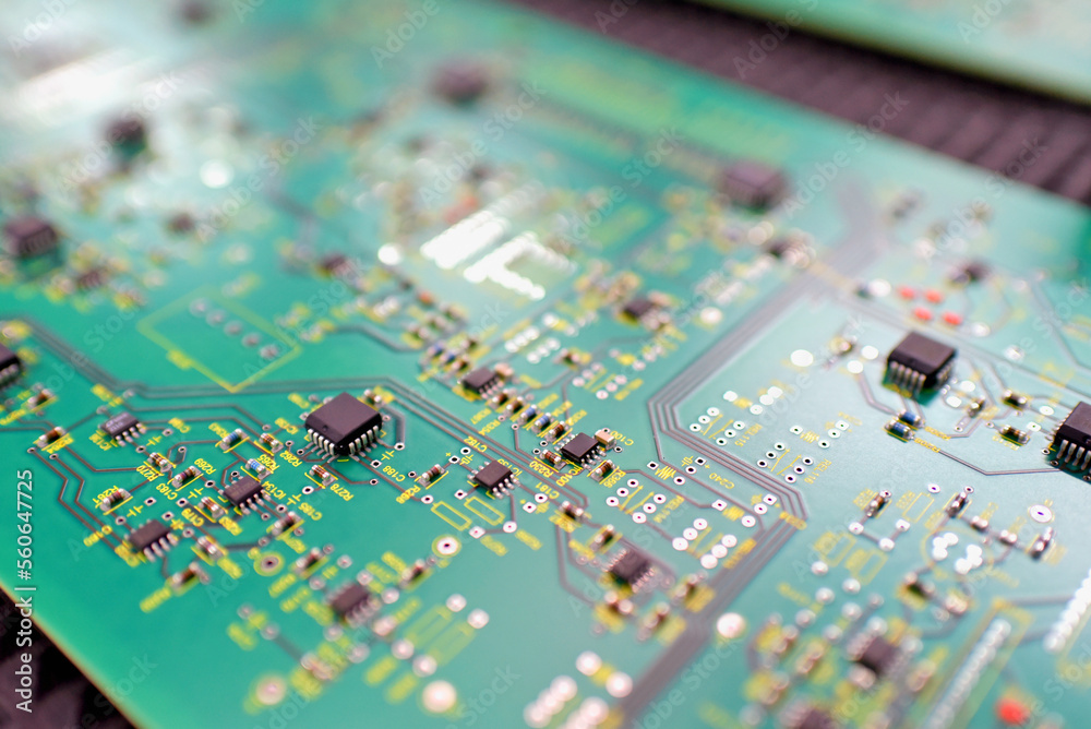 production of microelectronics in a modern industrial factory - motherboard with components in production production of microelectronics in a modern industrial factory - motherboard with components in production
