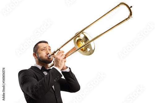 Cuadro en lienzo Elegant young man playing a trombone
