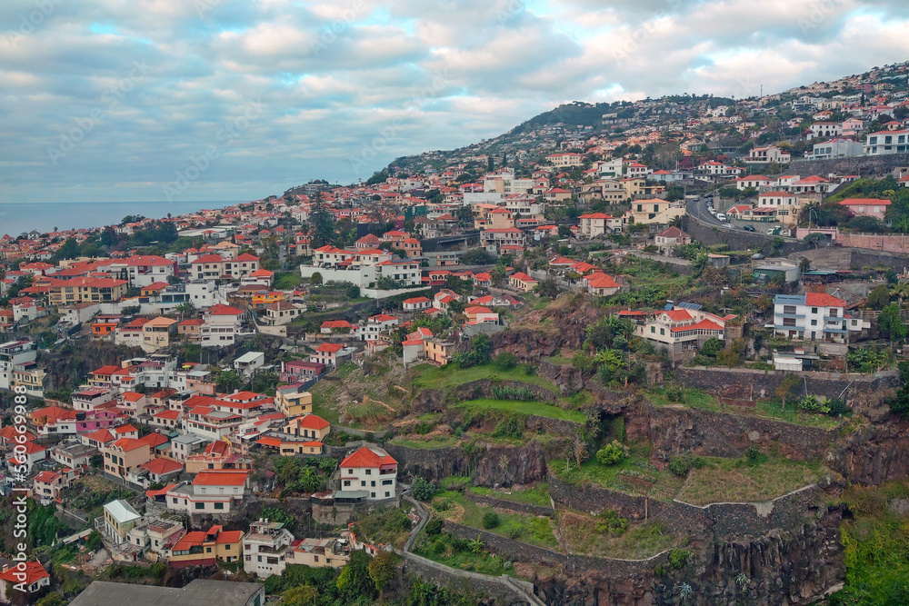 View of the houses on the slope of the island of Madeira in the Atlantic Ocean.