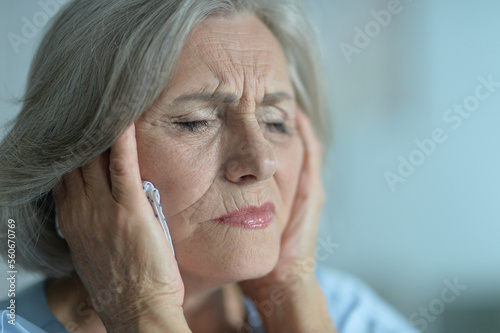 Close up portrait of sick old nice woman