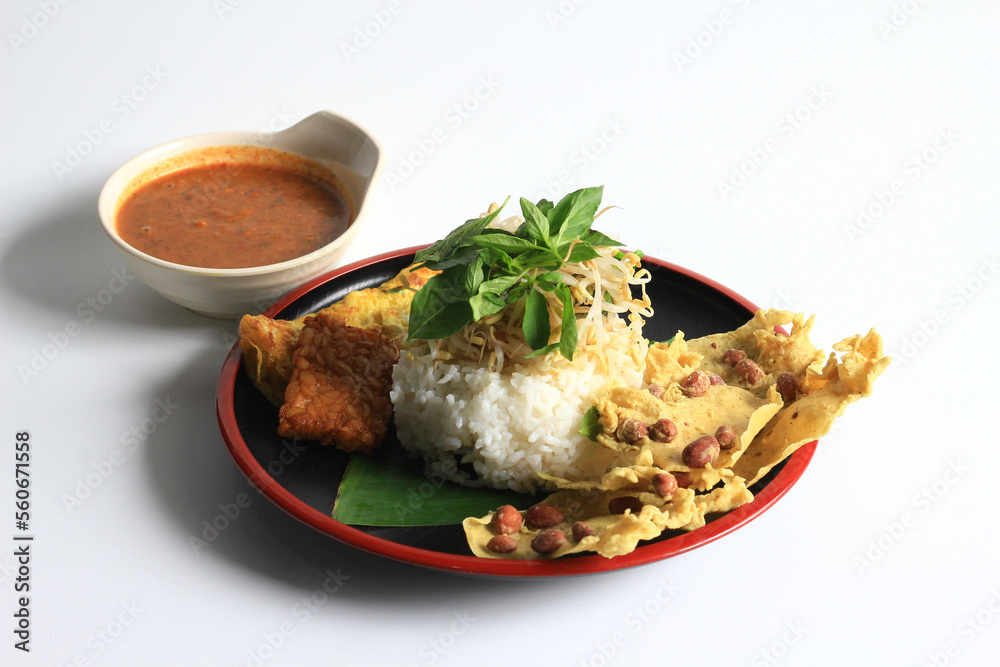 Nasi Pecel. Traditional Javanese rice dish of steamed rice with ...